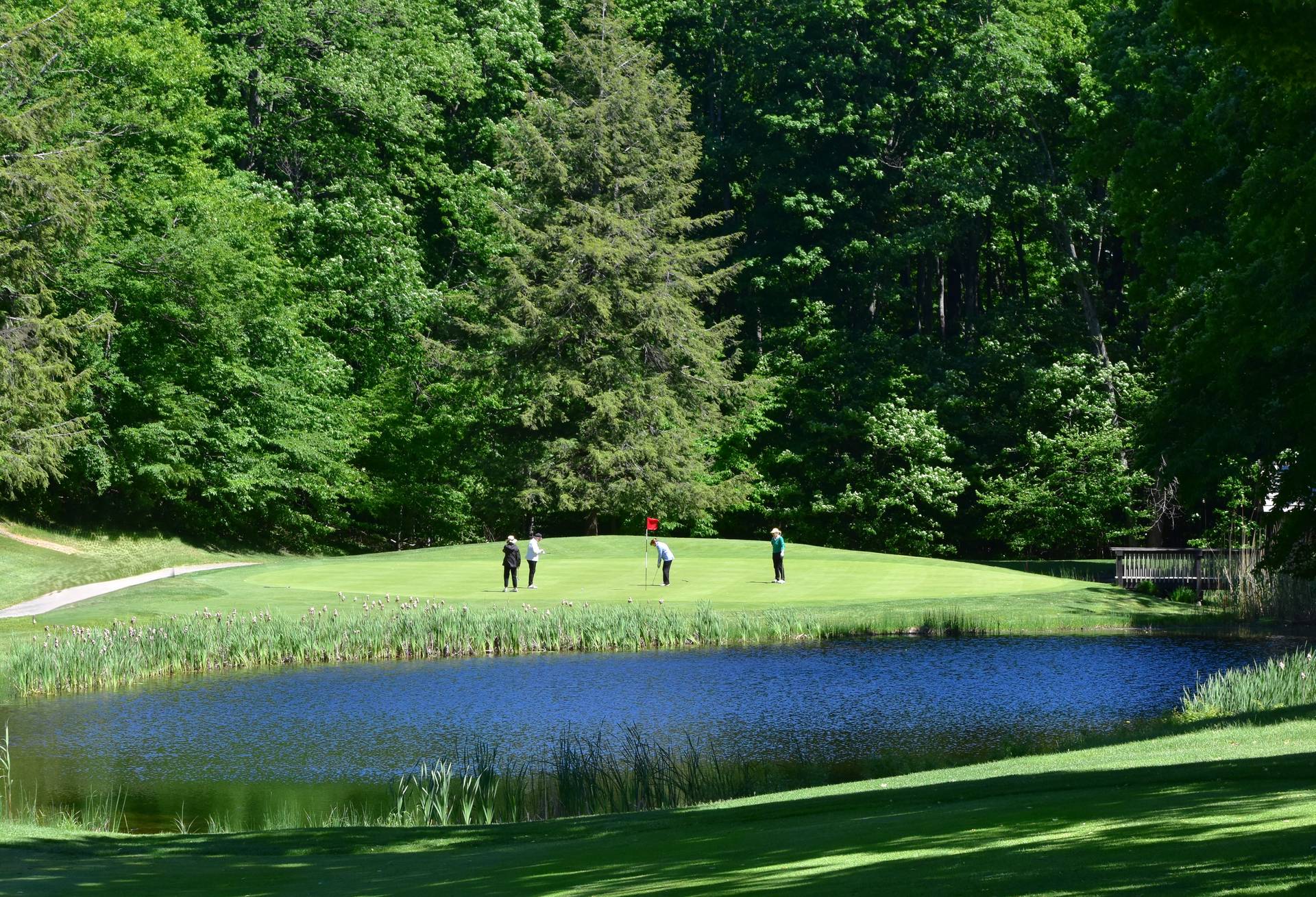 group of golfers on monument