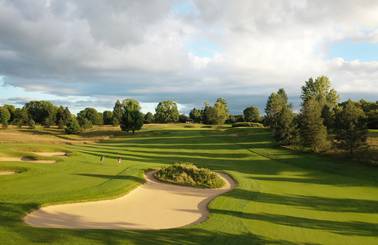people golfing the alpine at boyne mountain