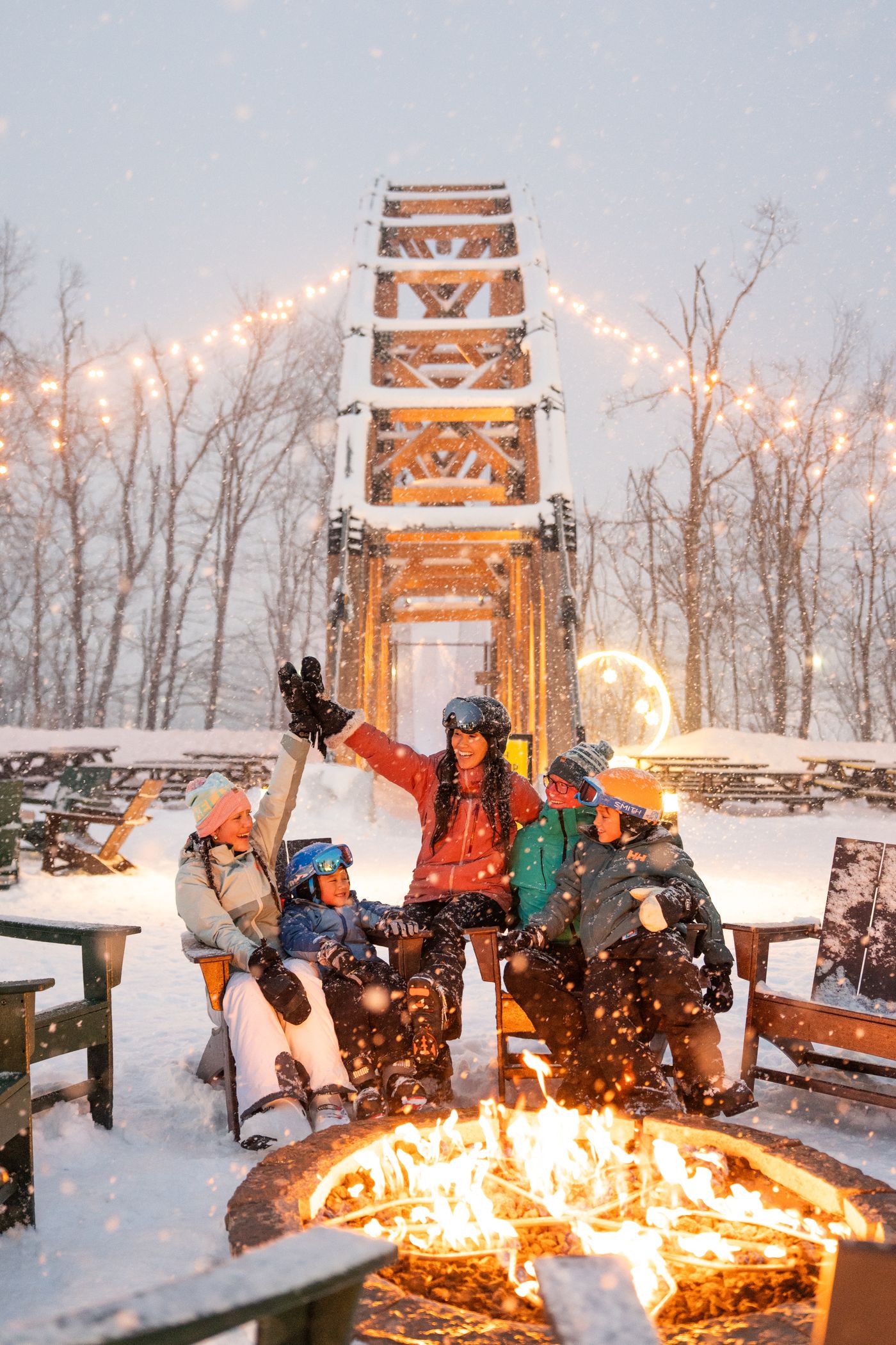Family around bonfire