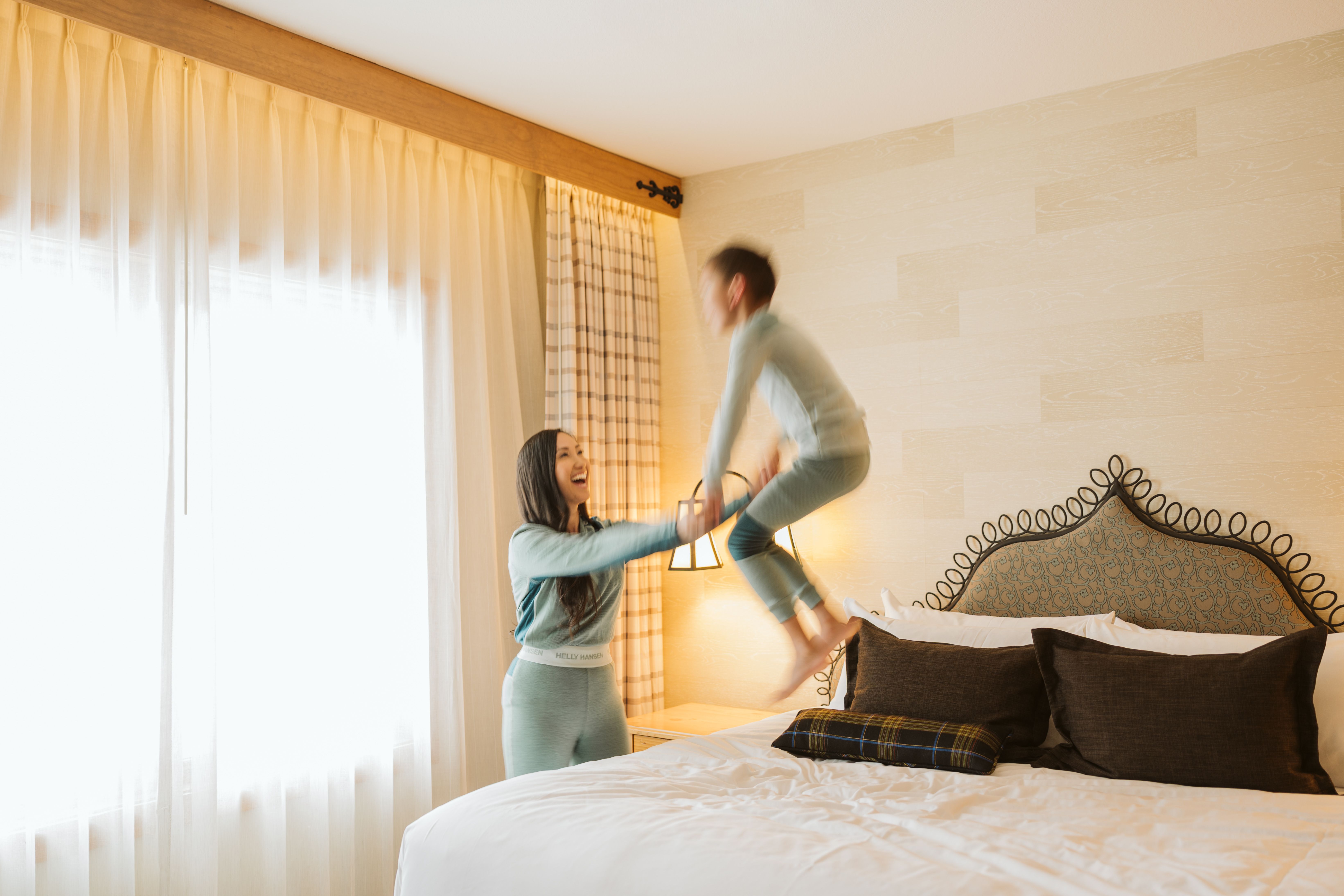 mom and son in hotel room