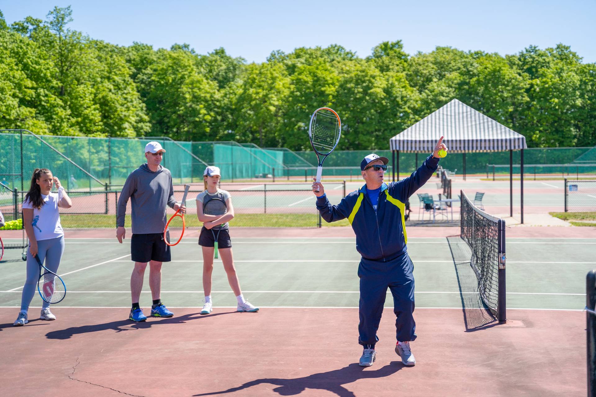 Coach is teaching technique.