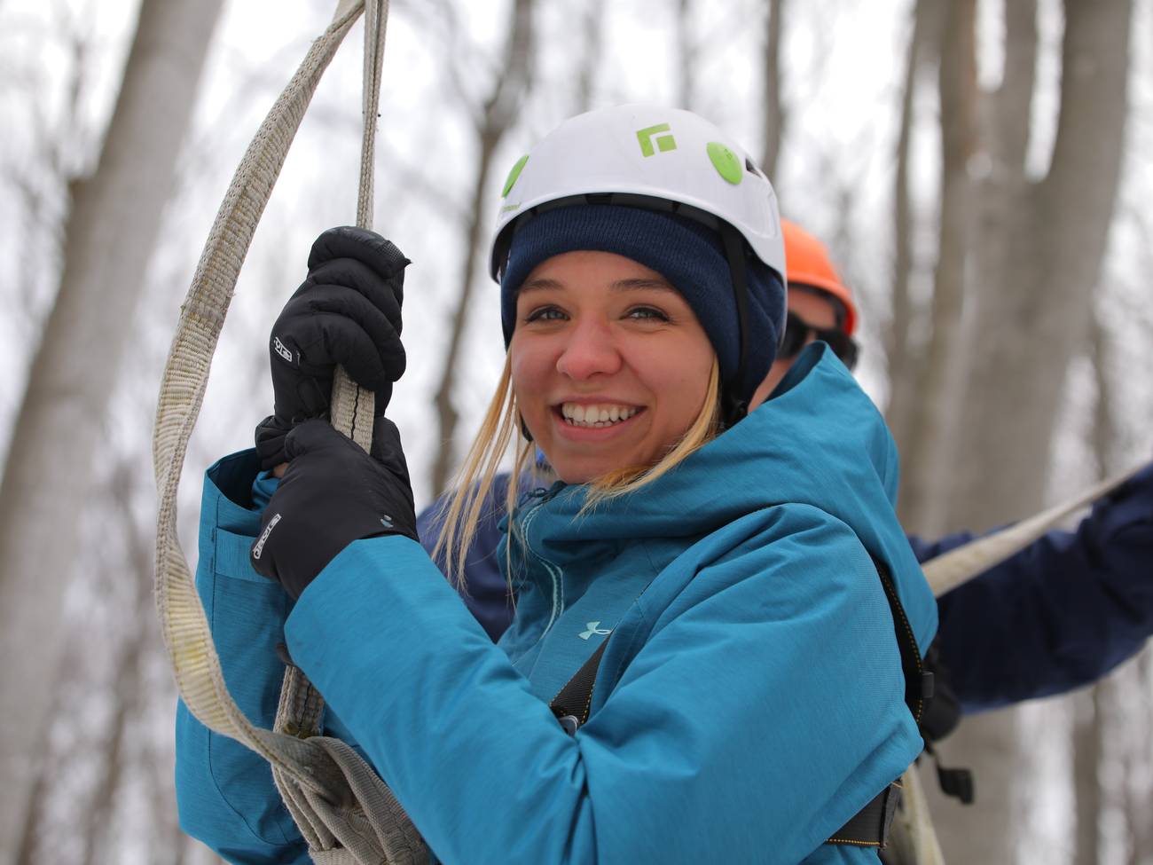 Lady getting ready to zipline