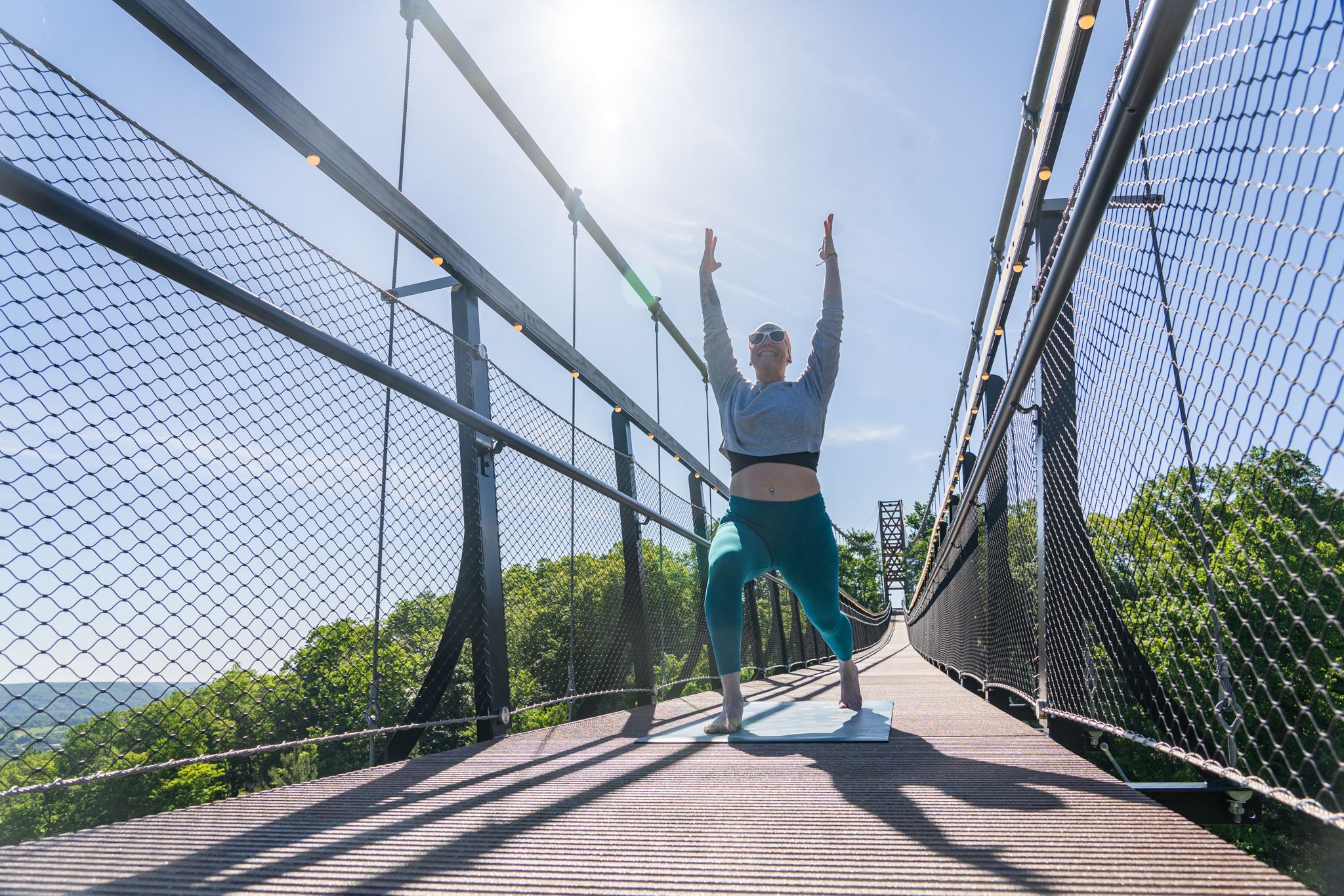 Aymey Kinney on SkyBridge doing Yoga