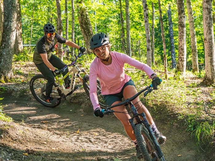 people biking at boyne mountain