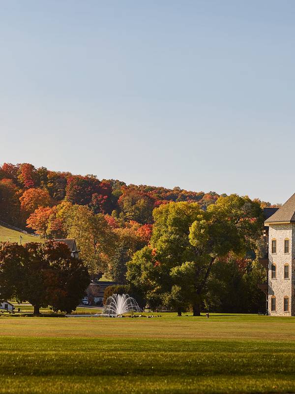 view of mountain grand lodge with fall colors