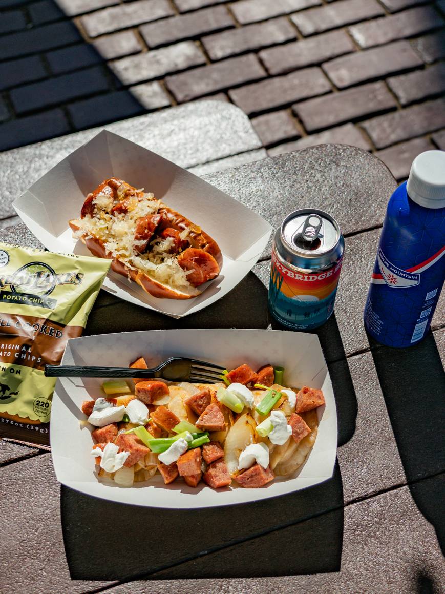 Pierogies and kielbasa on a picnic table at SkyBridge Michigan