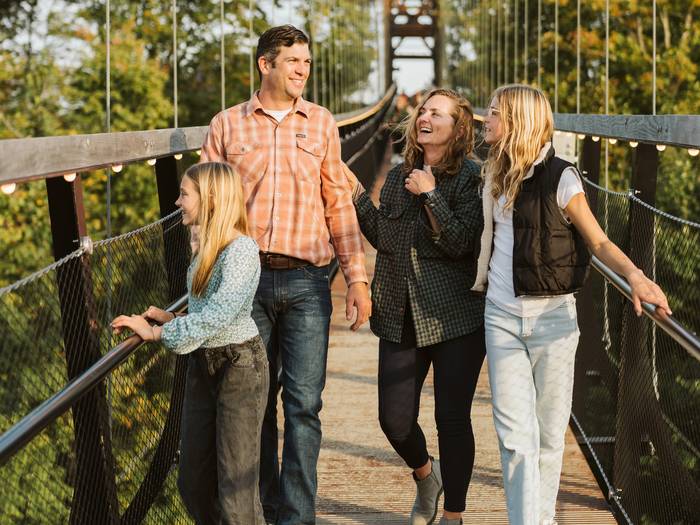 family walking on SkyBridge MIchigan
