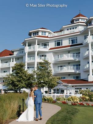 Couple Kissing in Front of Inn at Bay Harbor