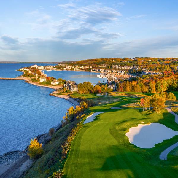 Aerial Bay Harbor Golf Club The Links course along Lake Michigan on autumn day