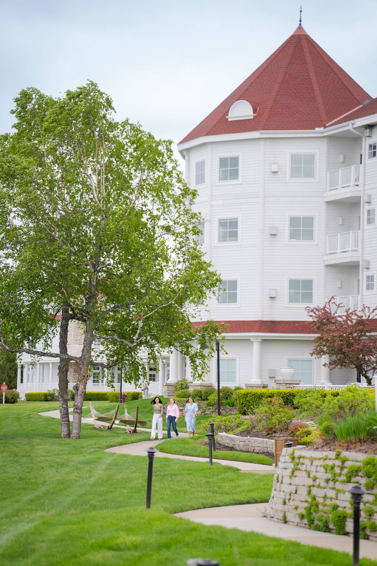 Women walking, spring gardens of Inn at Bay Harbor