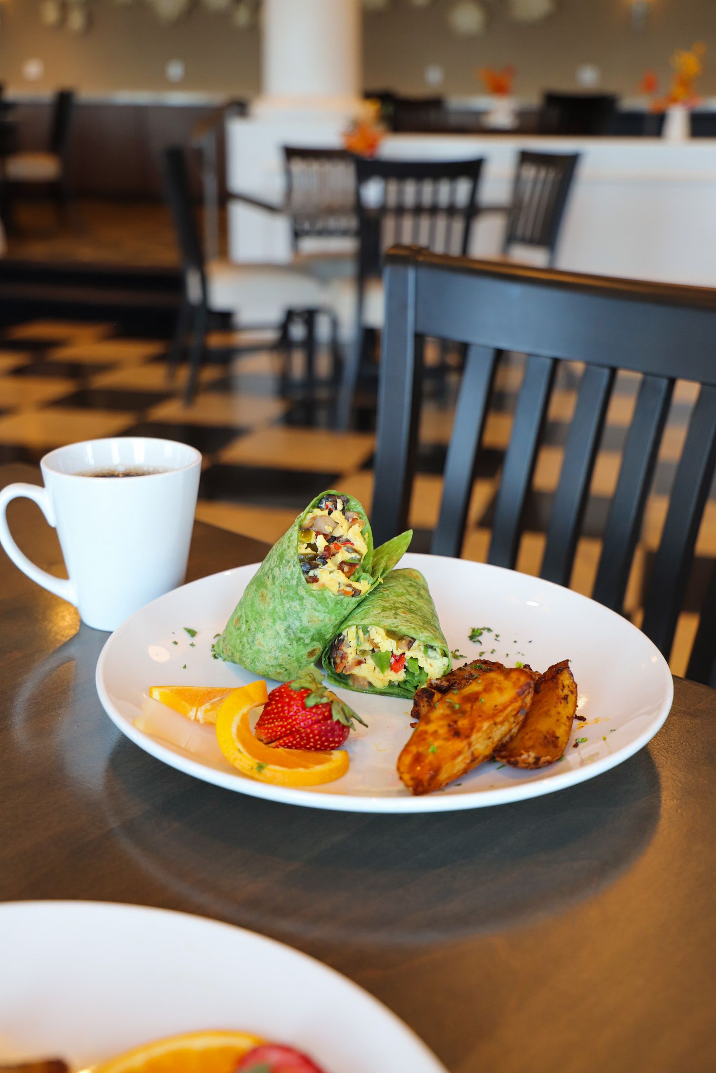 Breakfast Egg Wrap dish with coffee, The Sagamore Room