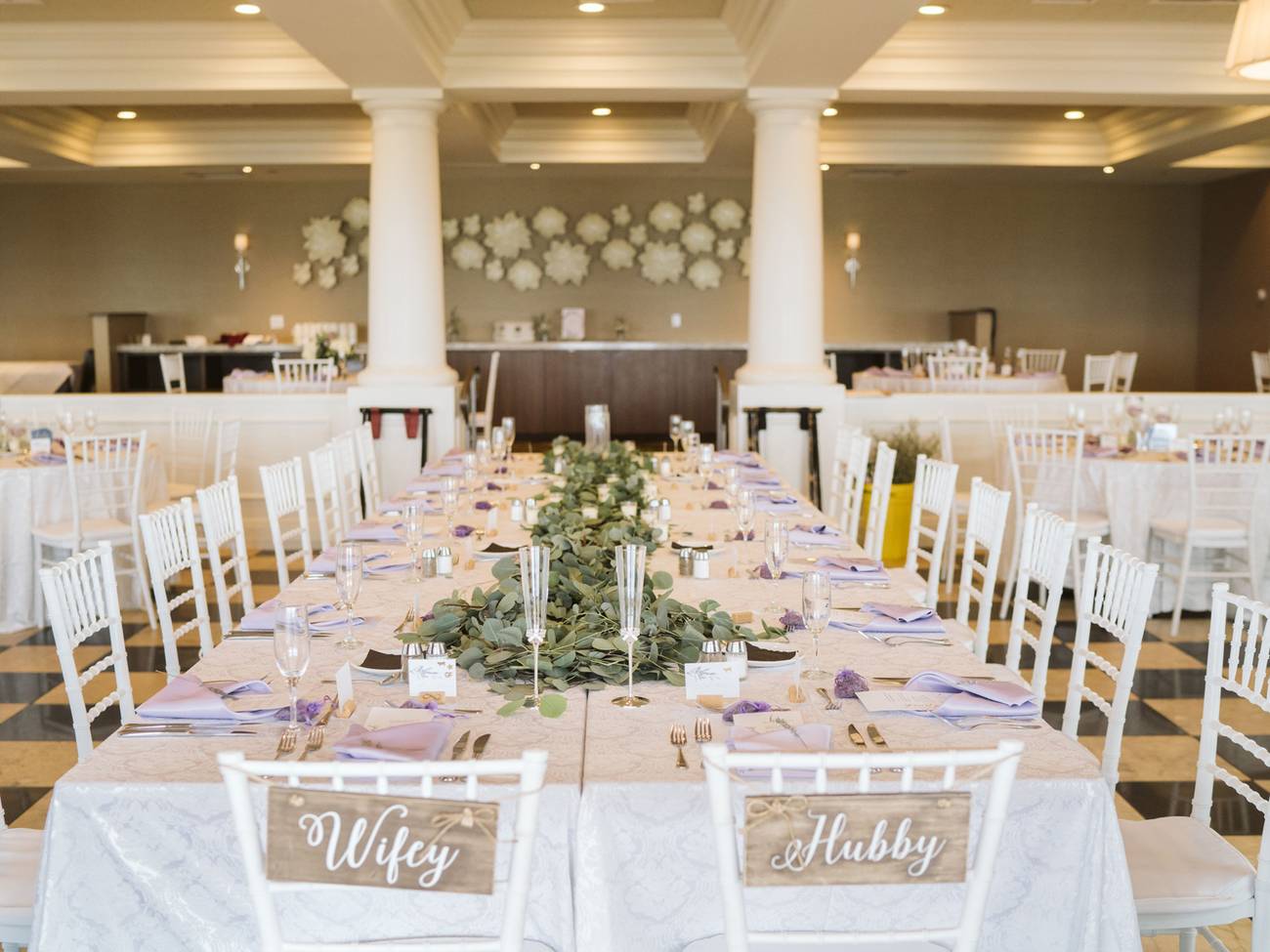 Greenery and lavender tablescape details for Inn at Bay Harbor wedding reception