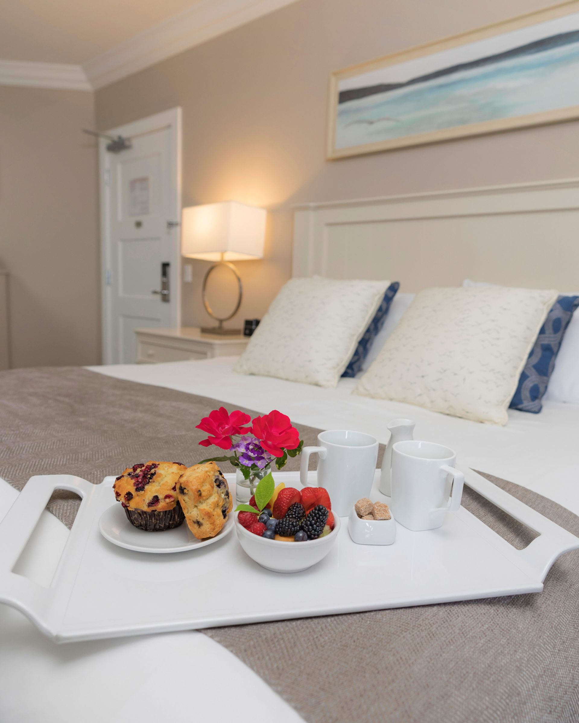 Breakfast tray on hotel bed, Inn at Bay Harbor