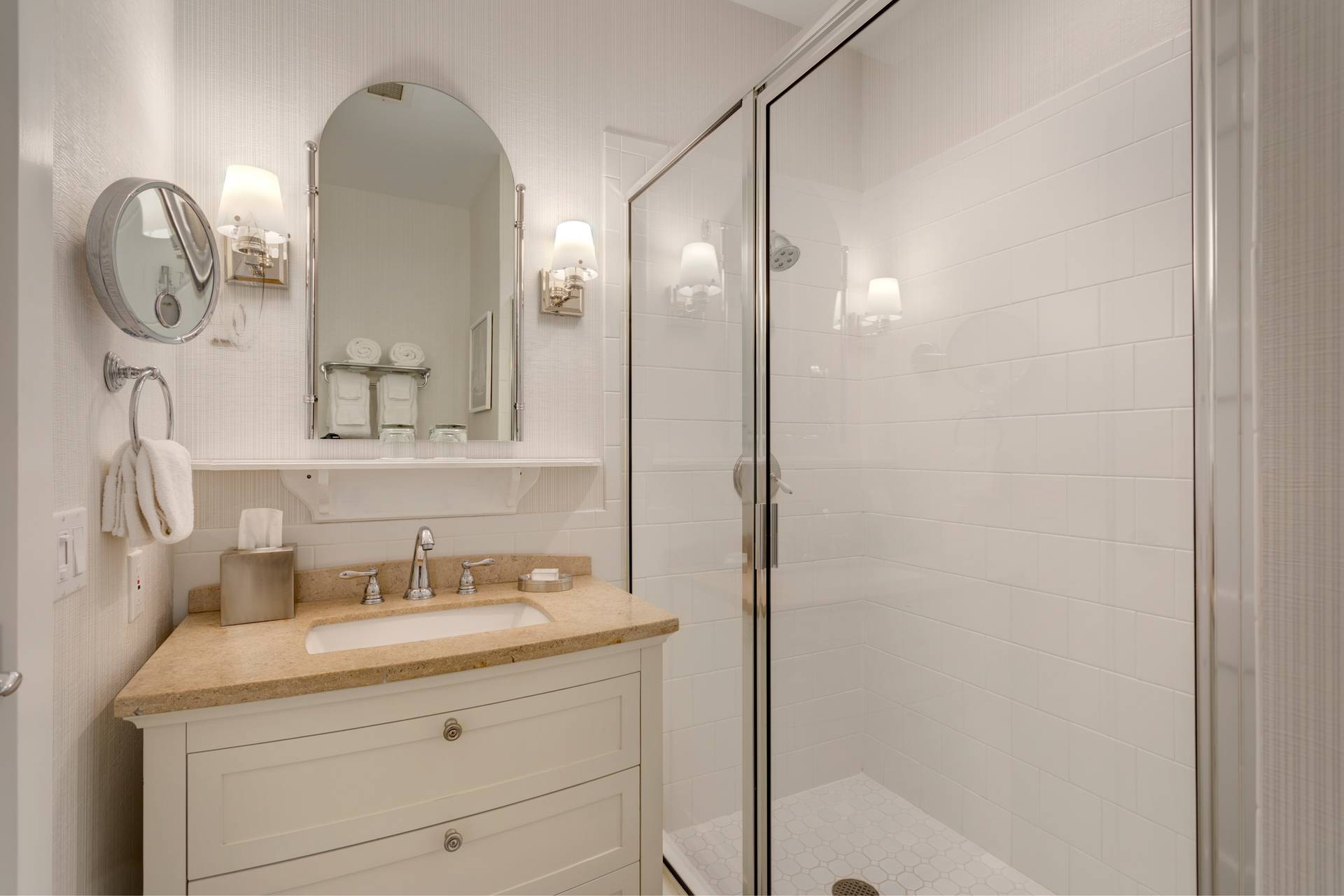 Grand king bathroom showing vanity and glass shower