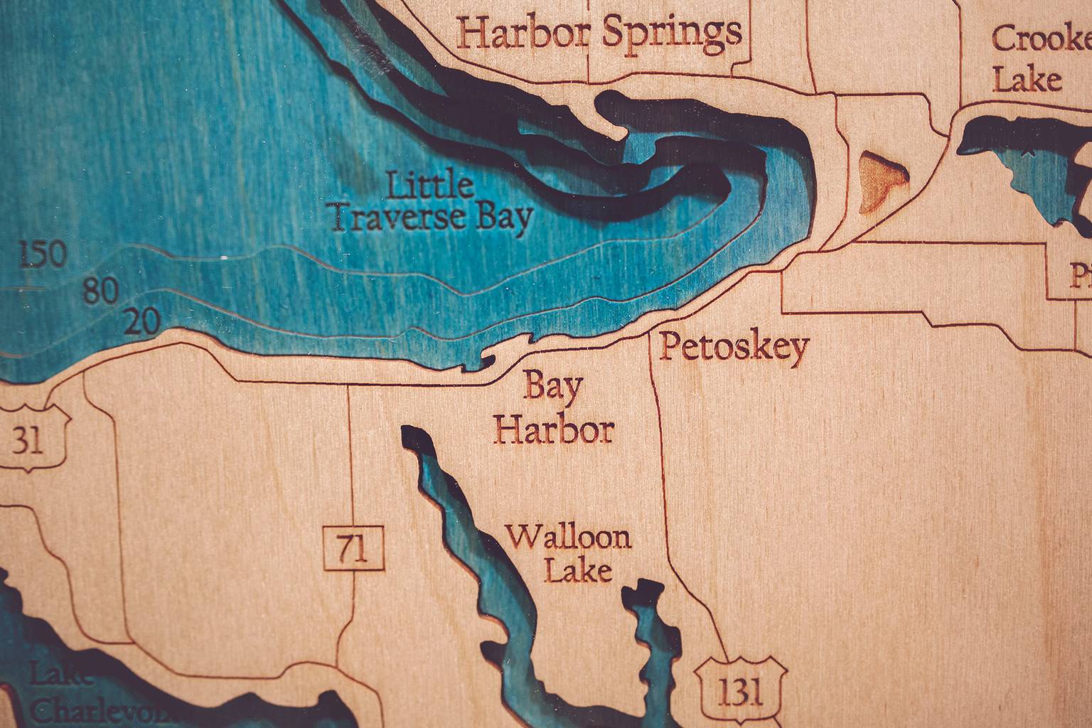Wood carving map art detail, Bay Harbor, Petoskey, Little Traverse Bay