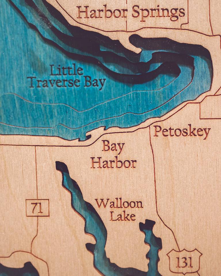 Wood carving map art detail, Bay Harbor, Petoskey, Little Traverse Bay