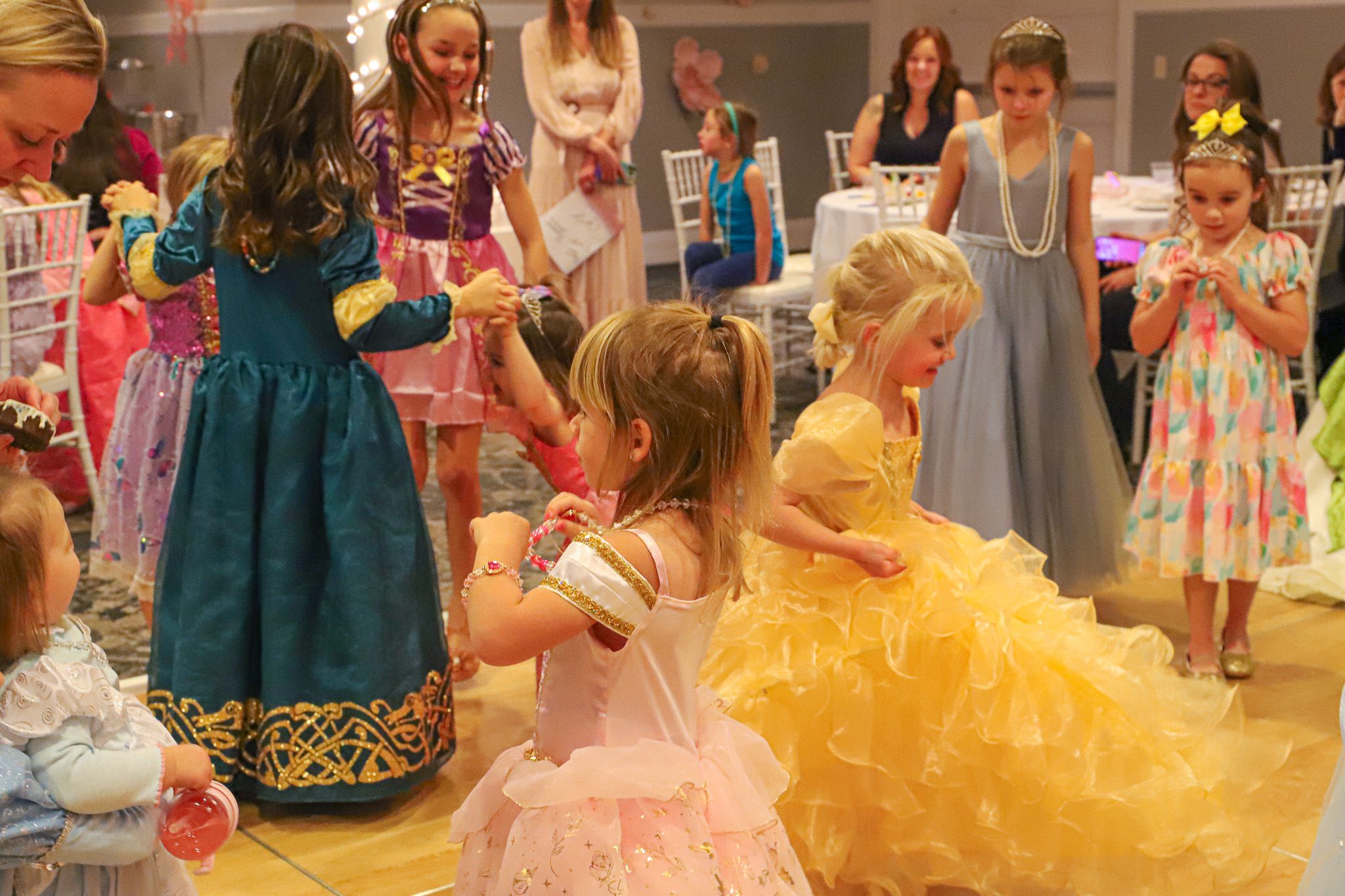 Princess Gala guests smile and dance together