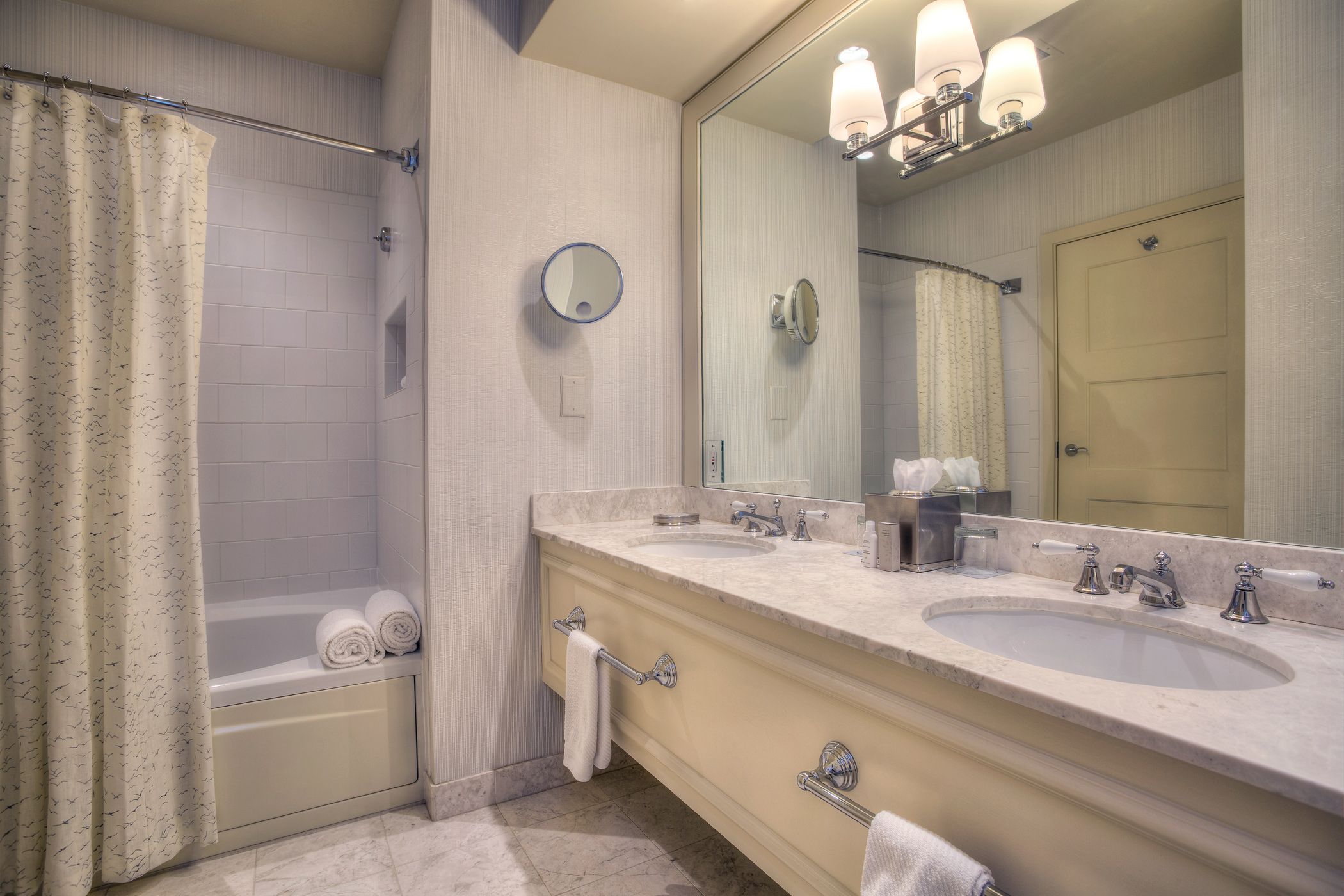 Master Suite bathroom view showing double vanities and tub