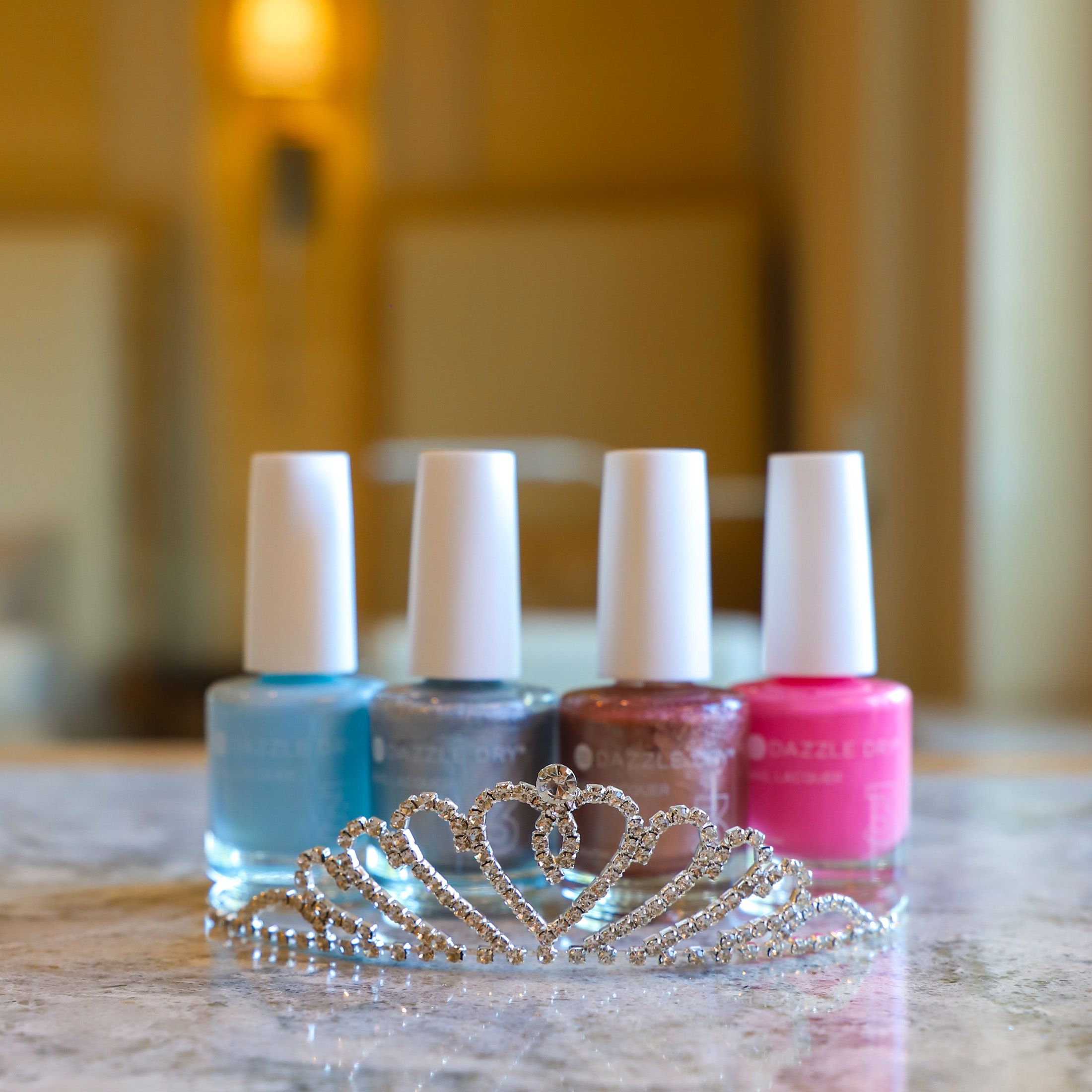 Jeweled tiara with bright, sparkly Dazzle Dry nail polishes, The Spa at Inn at Bay Harbor