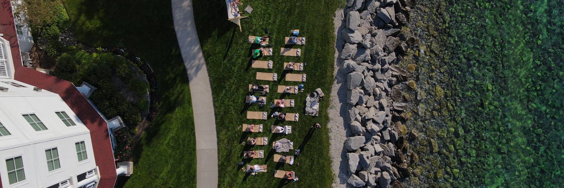 Meditation by the water at sunset