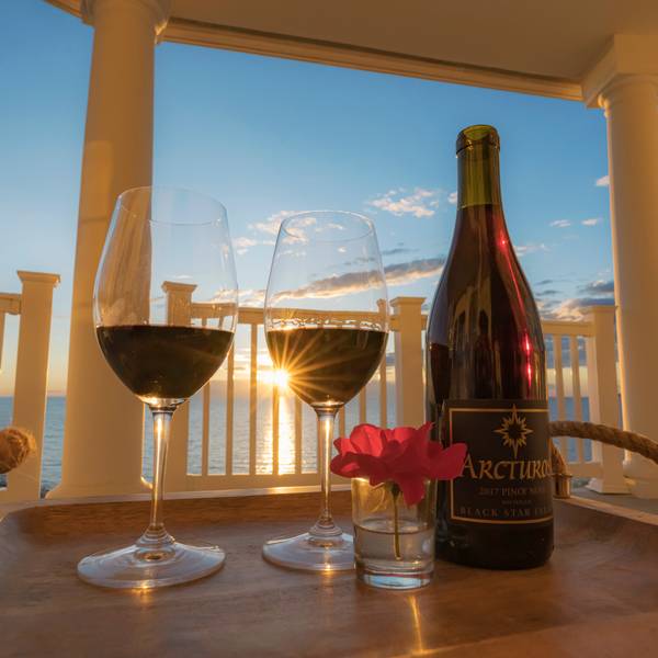 Wine glasses on Inn at Bay Harbor balcony