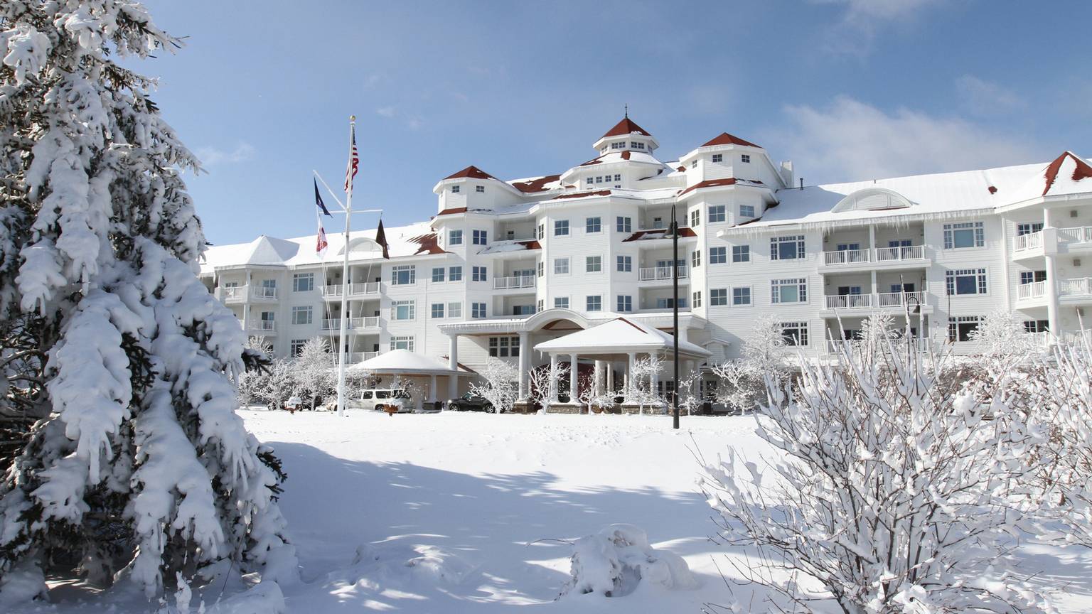 A snowy exterior of the Inn at Bay Harbor