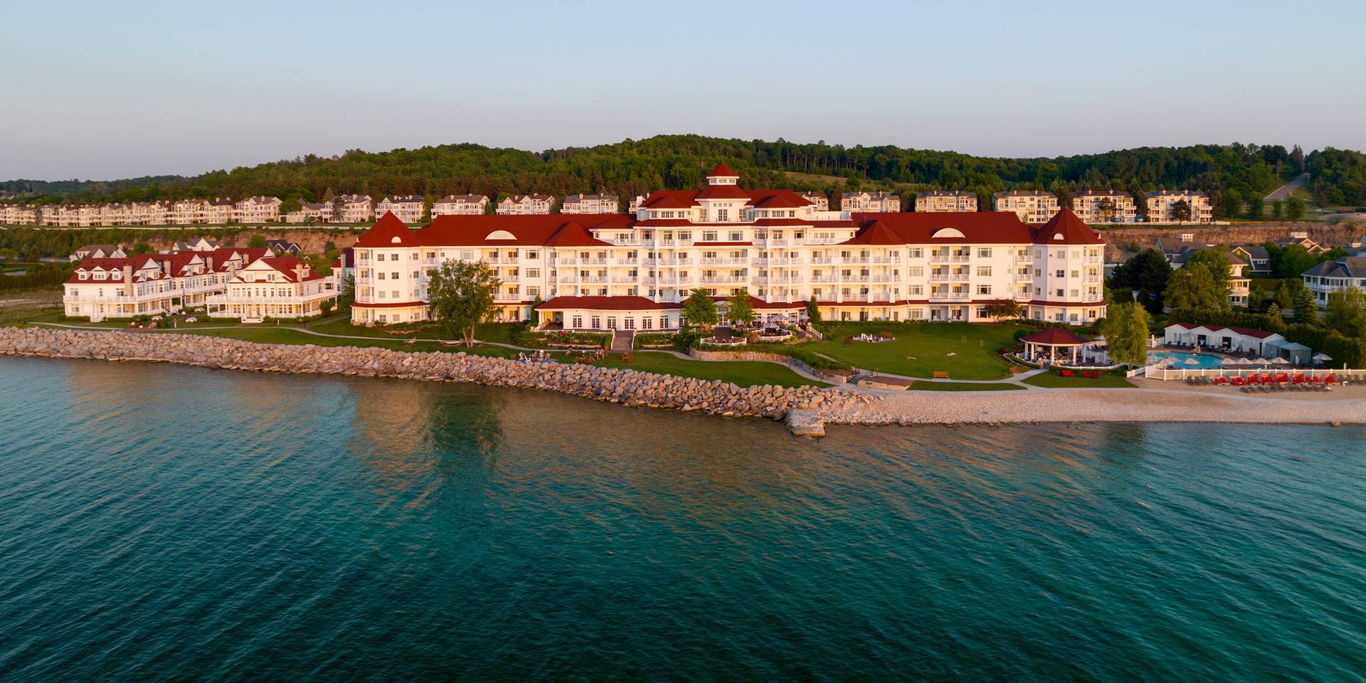 Evening light on front aerial view of Inn at Bay Harbor on Lake Michigan