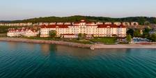 Evening light on front aerial view of Inn at Bay Harbor on Lake Michigan