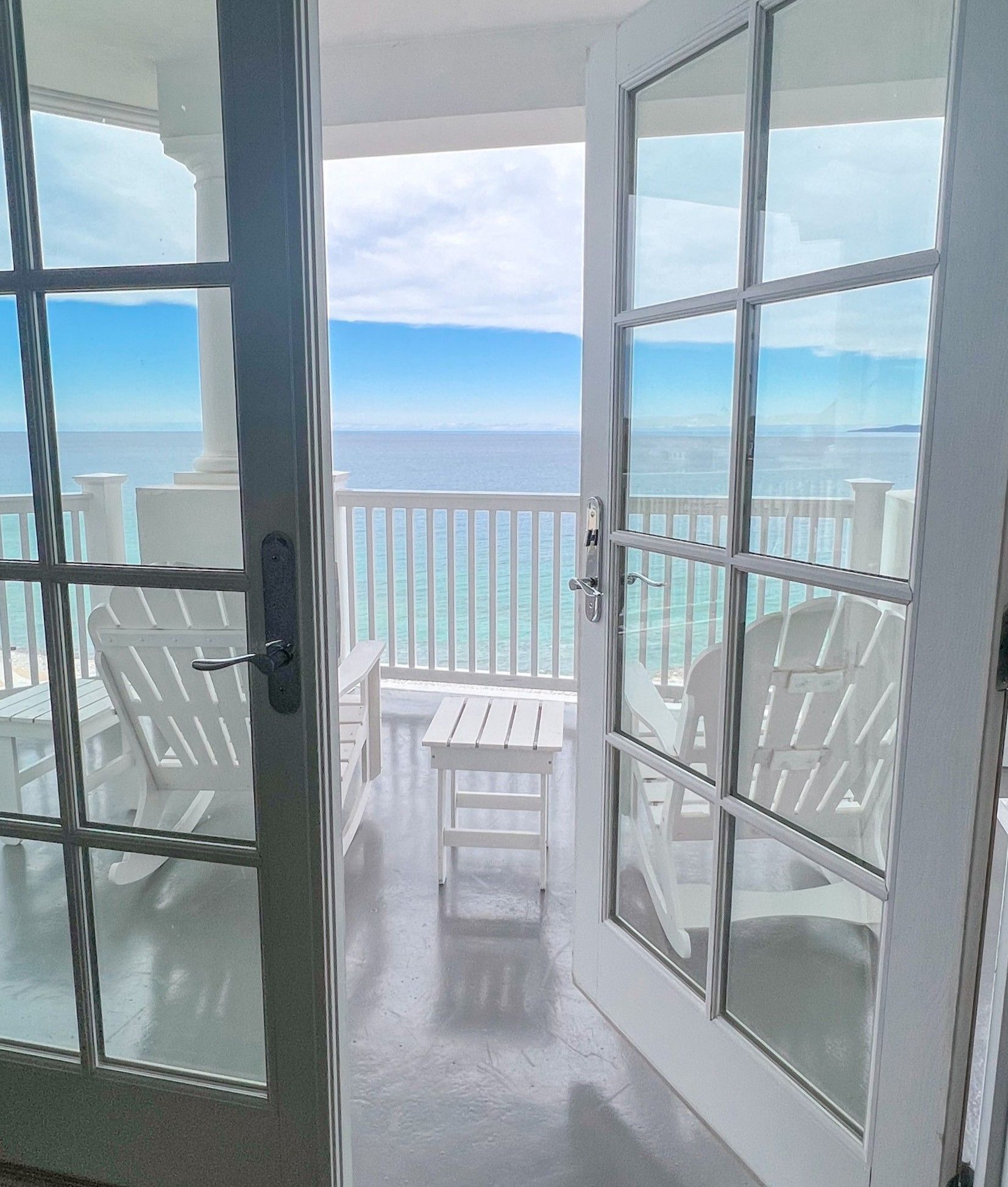 Open door to Lake Michigan balcony, spring skies
