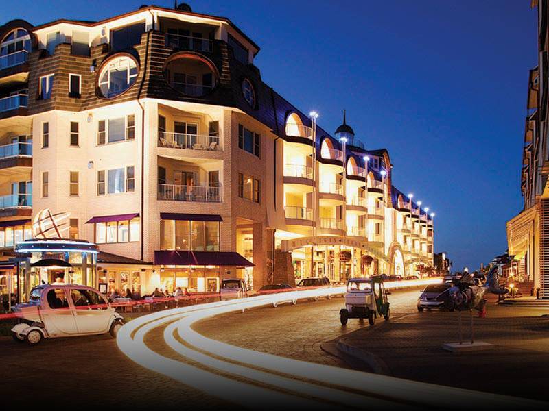 Village at Bay Harbor with cars in night light