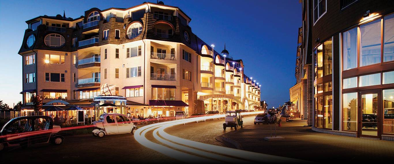 Village at Bay Harbor with cars in night light