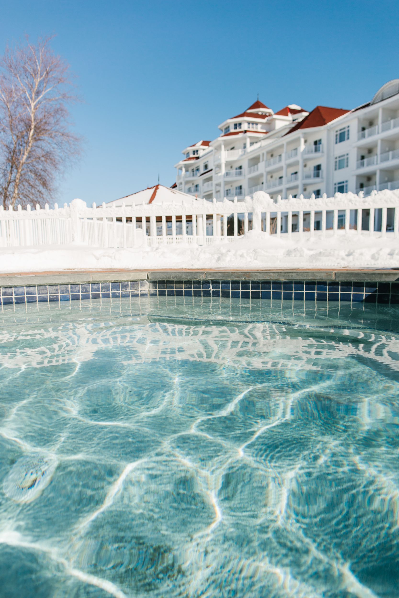 Blue water shimmers in winter hot tub, Inn at Bay Harbor