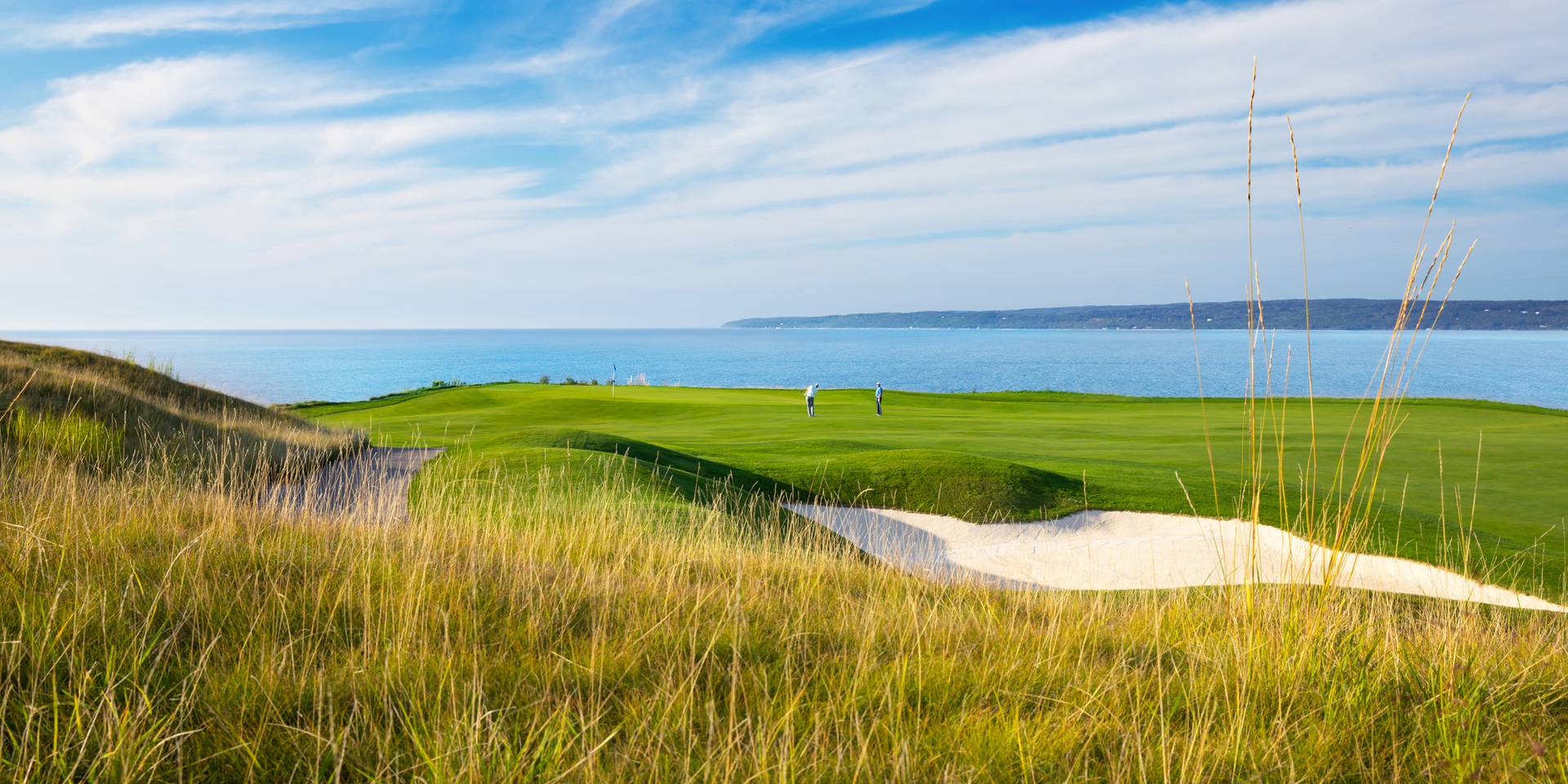 Golfers on The Links course, fescue and Lake Michigan, Bay Harbor Golf Club