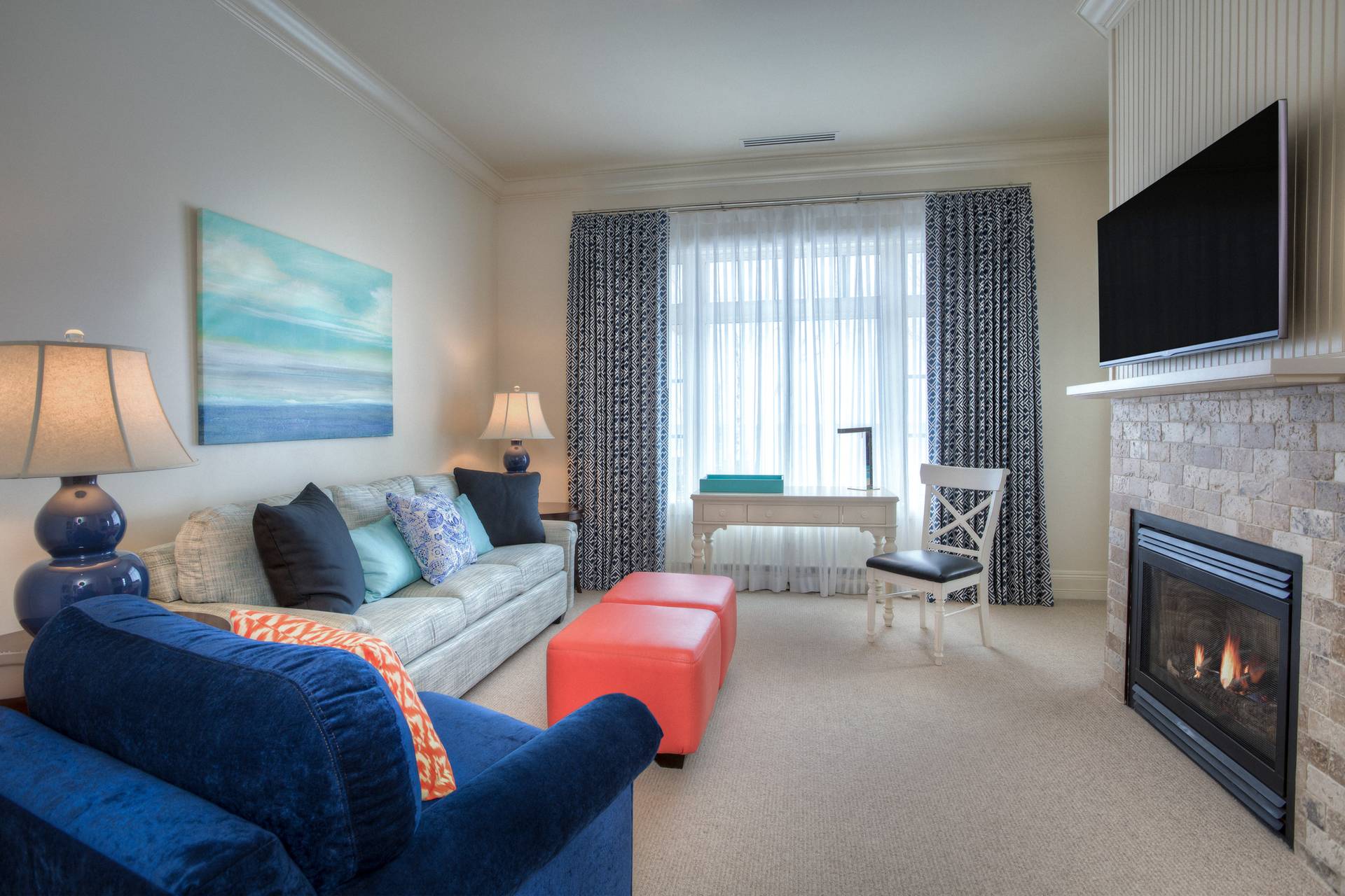 Master Suite, Inn at Bay Harbor, living area seating and fireplace