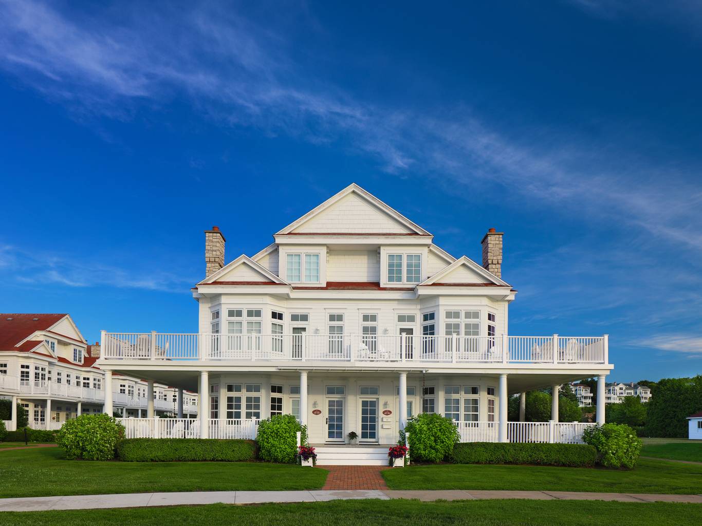Lakeside Cottages front exterior under clear blue summer sky