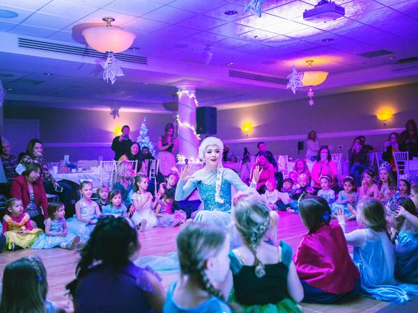 Elsa character performs for gathered children, Inn at Bay Harbor