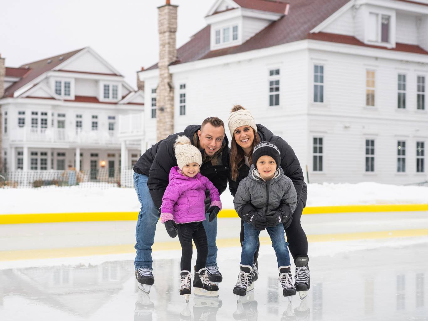 Family on ice skates, Cottages at Bay Harbor