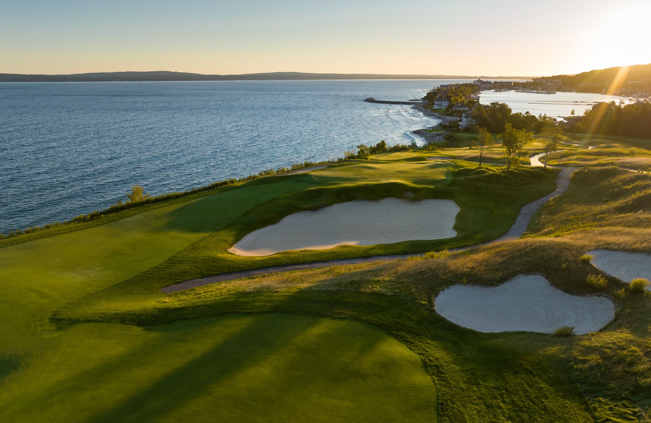 Sunrise over Bay Harbor Golf Club course on Lake Michigan