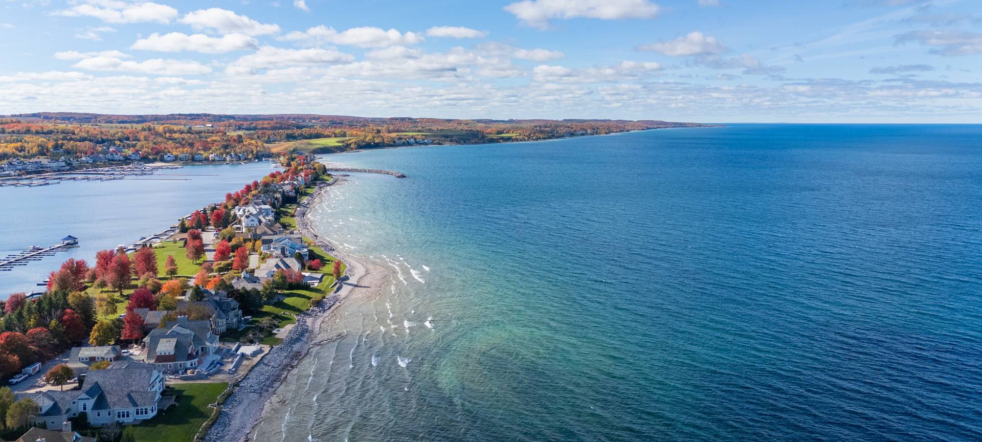 Colorful autumn trees of Bay Harbor along Lake Michigan