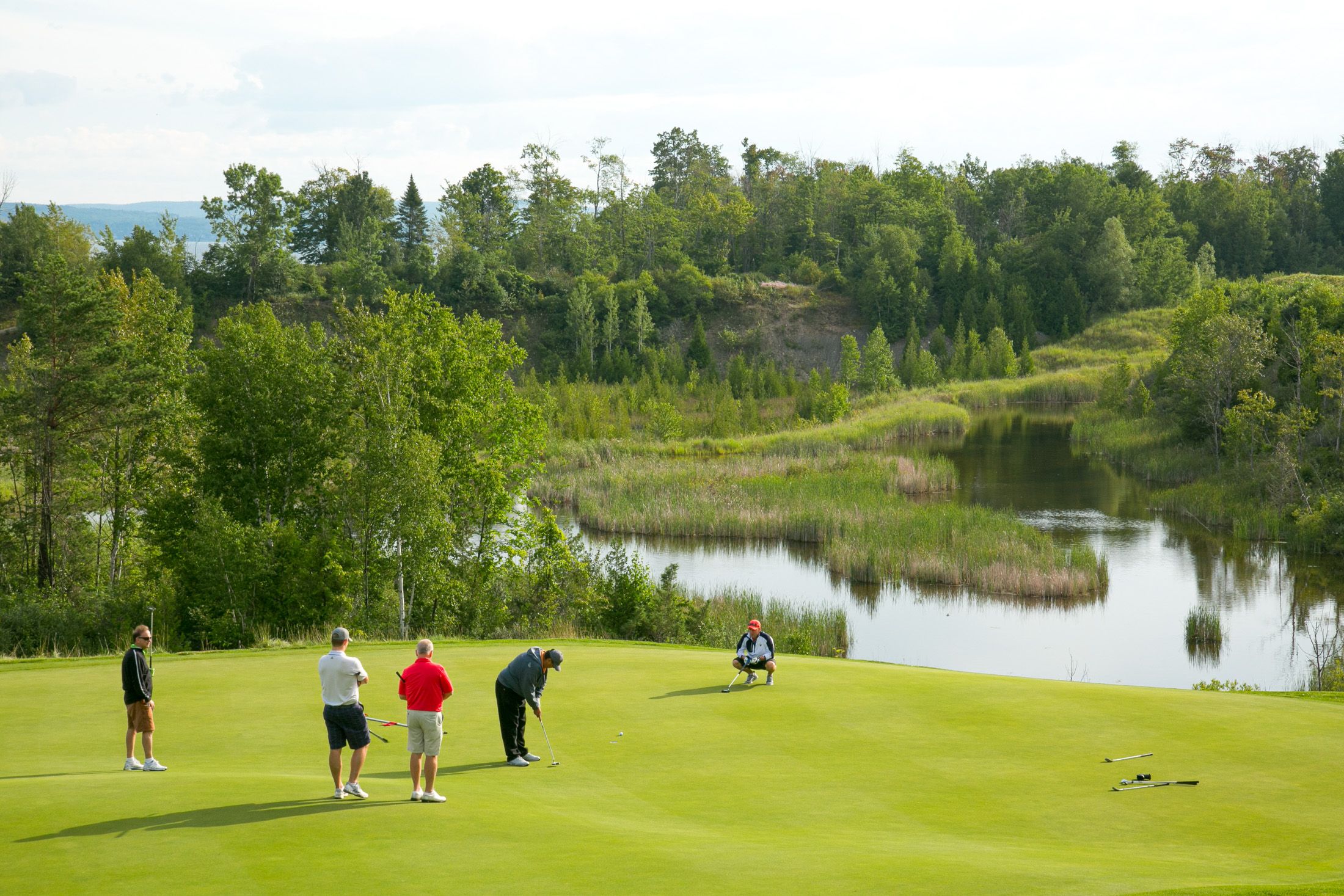 Golfers deliberate shot on The Quarry, Bay Harbor Golf Club
