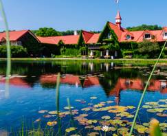 The Highlands front pond with the Main Lodge in the background