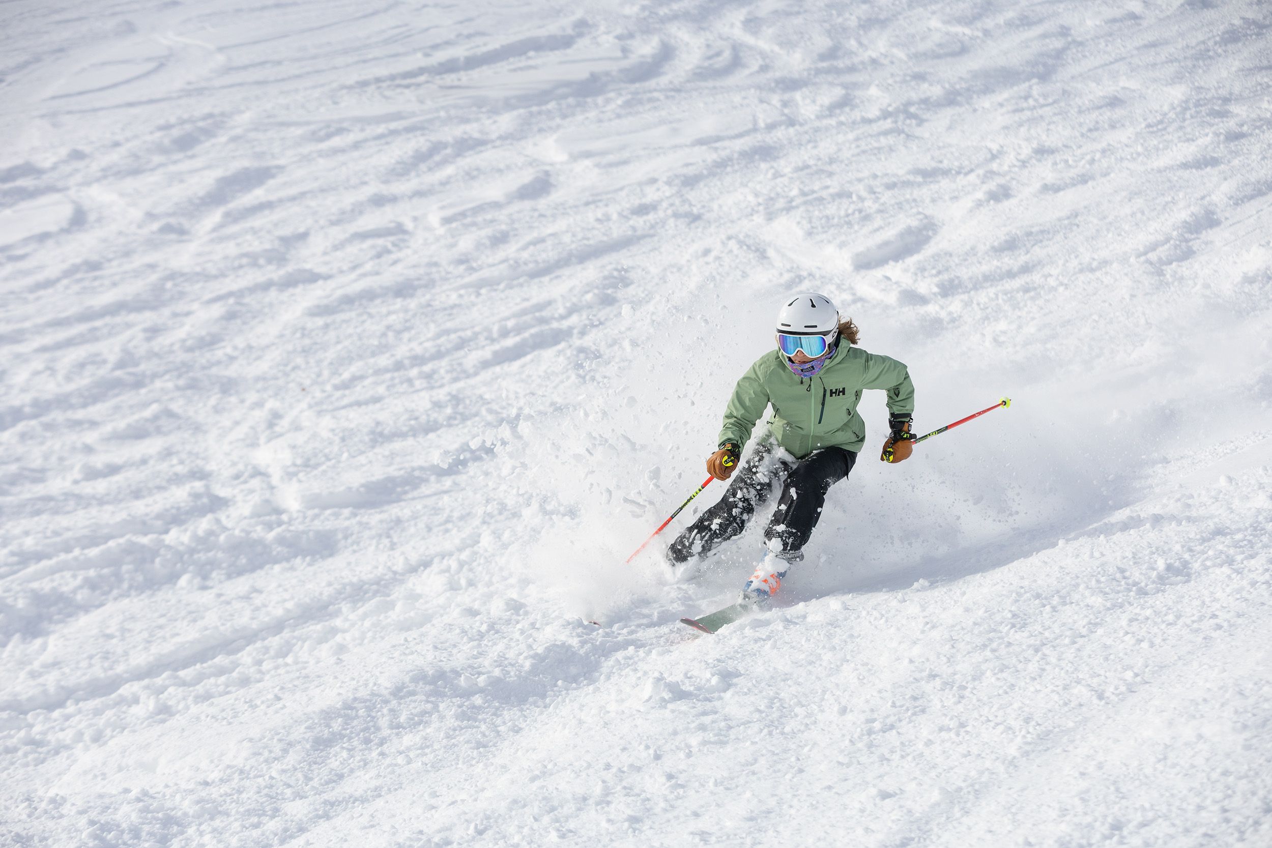 A woman skiing in powder
