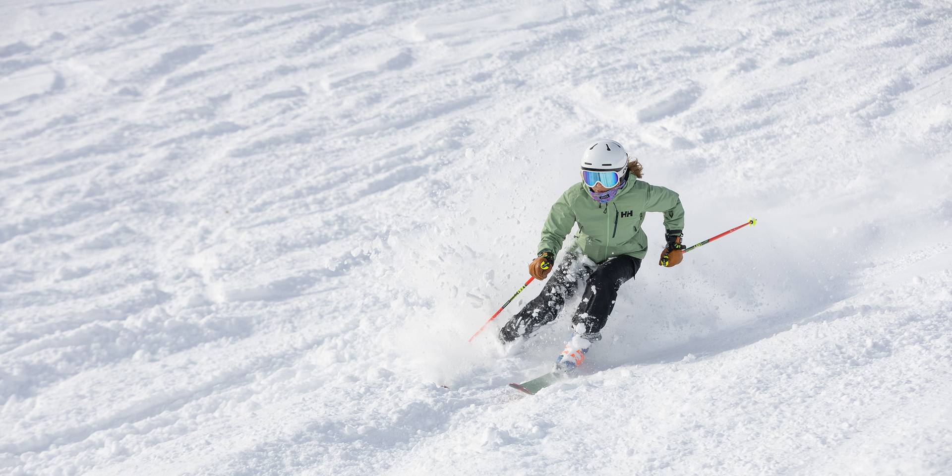 A woman skiing in powder