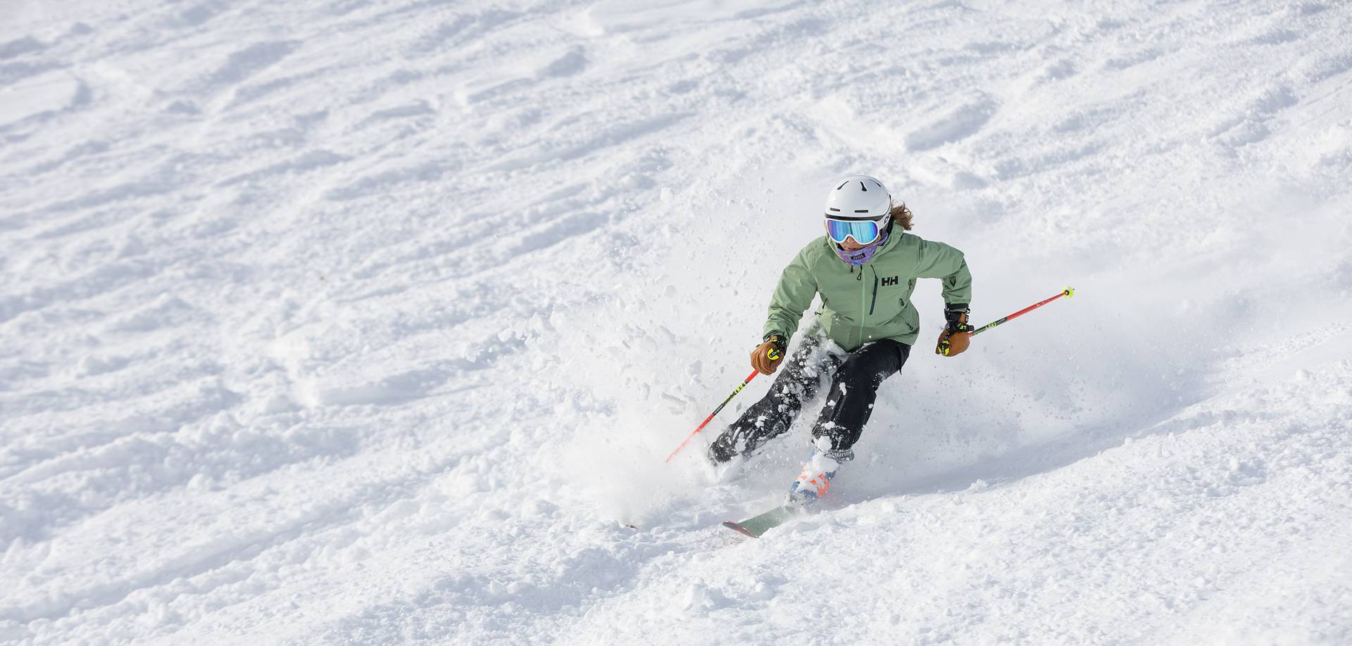 A woman skiing in powder
