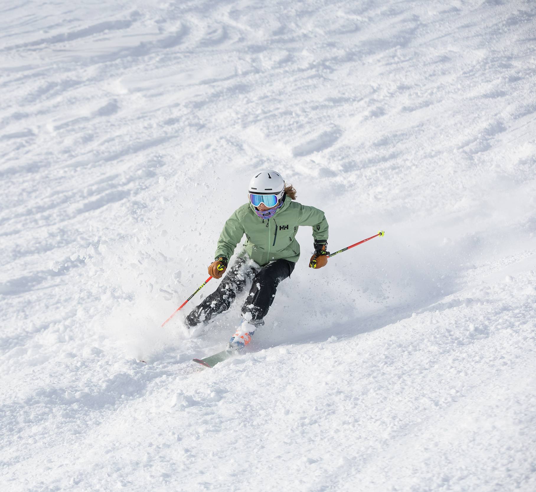 A woman skiing in powder