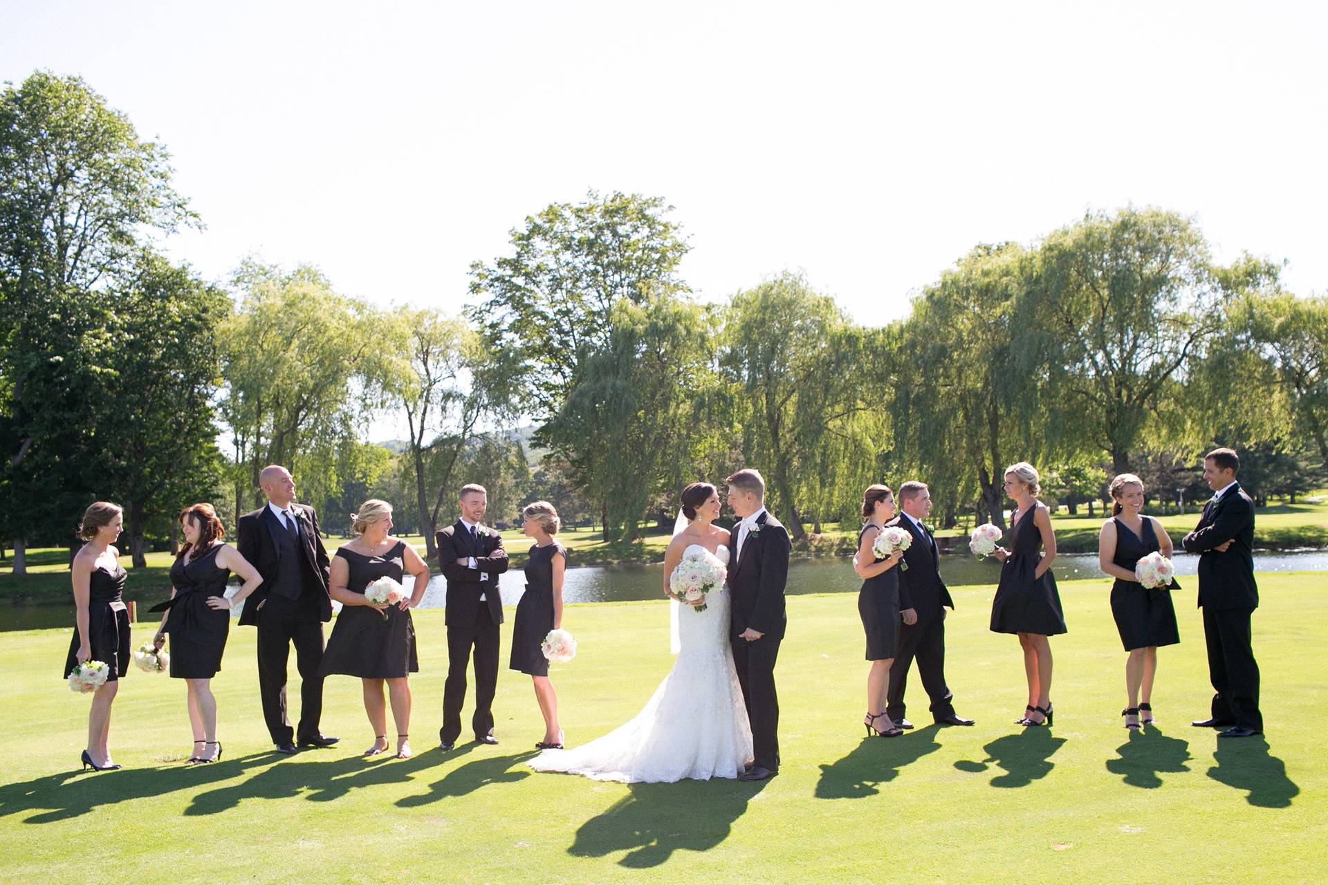 A wedding party posing