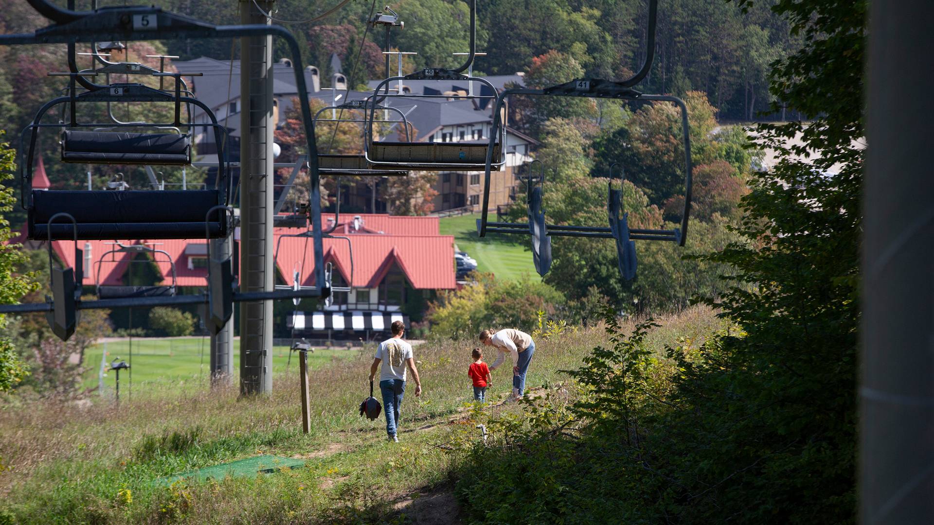 A family playing disc golf