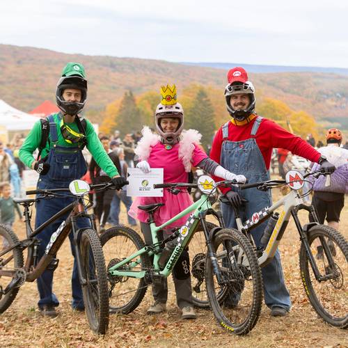 A group of mountain bikers in costumes