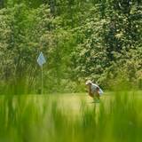 A golfer at The Highlands