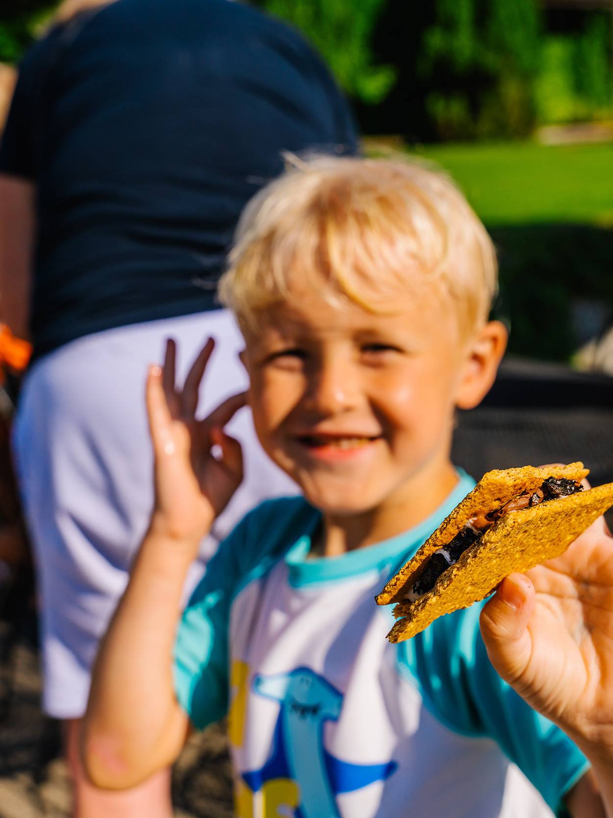 A family on a pedal boat in the pond